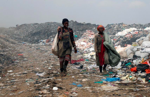 Women in a plastic waste field